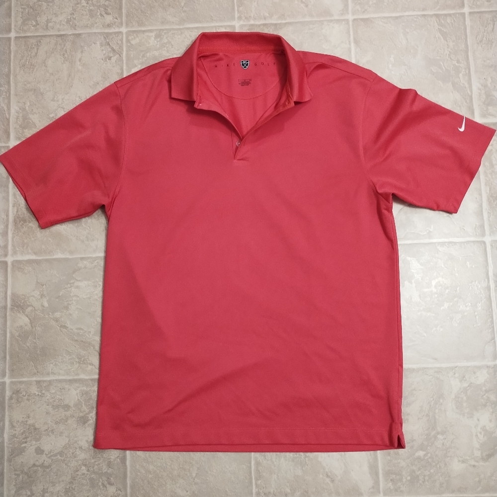 Men's pink Nike golf shirt